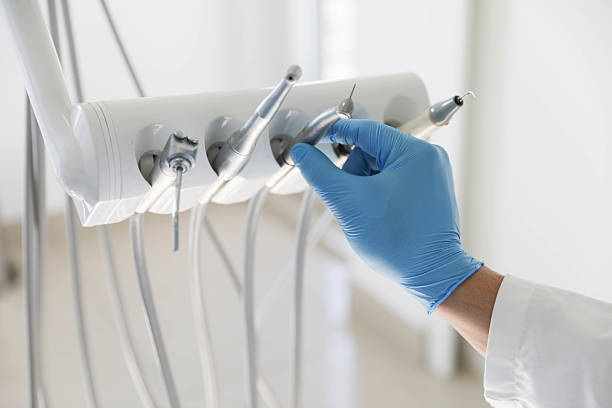 Professional Tooth Extraction technician working in Bangor Base, WA